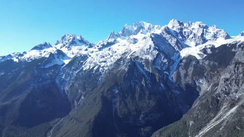 Aerial View of a Snow-Capped Mountain Landscape Video stock 324627221