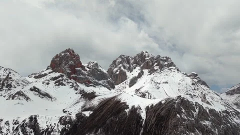 Aerial View of Snow-Capped Mountain Peaks in Qizanggou, Sichuan, China Stock Footage 338309047