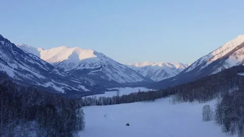 Aerial View of Snow-Capped Mountains in Altay, Xinjiang, China Stock Footage 304017066