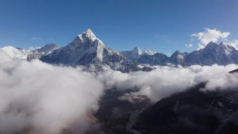 Aerial View of Snow-Capped Mountains in Nepal, Capturing Majestic Peaks Amidst Stock Footage 312469009