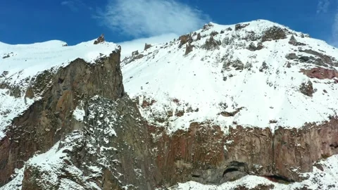 Aerial View of Snow Capped Mountains in the North Caucasus, Russia Stock Footage 320856897