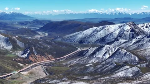 Aerial view of snow-capped mountains, Stock Footage 324973255