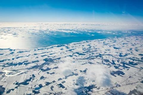 Aerial View of Snow covered Coastline Stock Photos