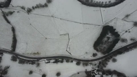 Aerial View Of Snow Covered Fields In The British Countryside - Lake District Stock Footage 239577531
