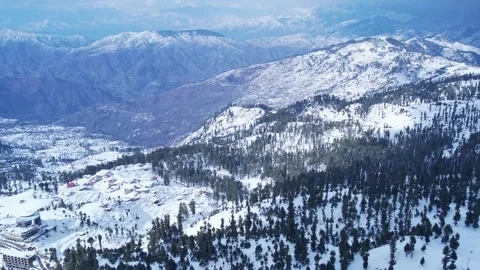 Aerial view of Snow covered Himalayan mountains and Malam Jabba Hill station Stock Footage 269492074
