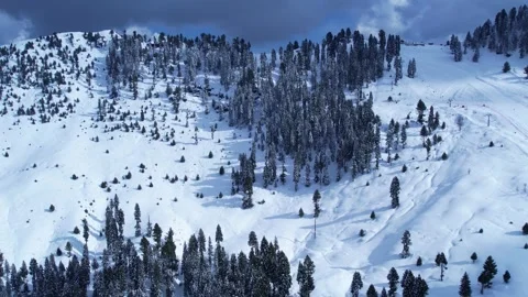 Aerial view of snow covered Malam Jabba Ski slope in Himalayan Mountain Pakistan Stock Footage 269457727