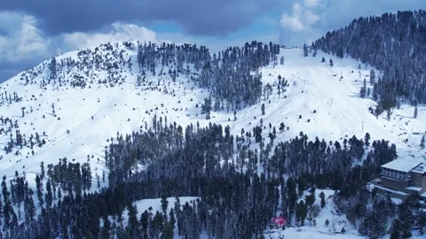 Aerial view of snow covered Malam Jabba Ski resort in Himalayan Mountains Stock Footage 269460148