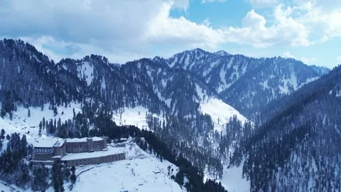 Aerial view of snow covered Malam Jabba hill station in Himalayan mountains Stock Footage 269473676