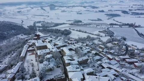 Aerial View of Snow Covered Medieval Village of Vignale Monferrato in Piedmont Video stock 166633448