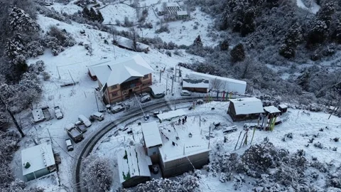 Aerial View snow covered rooftops in Lachen village North Sikkim, India 스톡 동영상 330241231