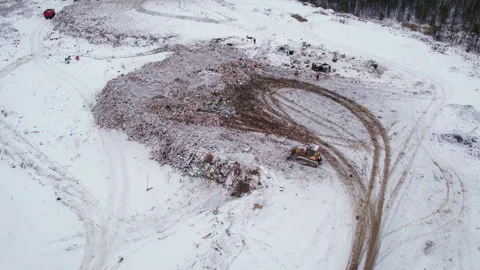 Aerial view of a snow-covered solid waste landfill Video stock 285843706