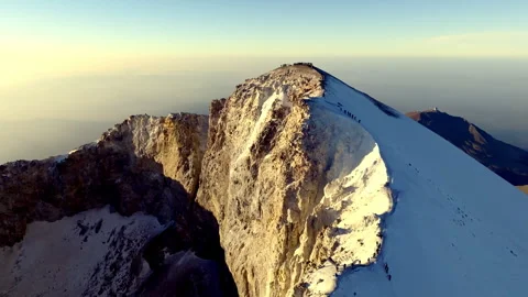 Aerial view of the snow covered summit of Pico de Orizaba volcano in Mexico. Stock Footage 344350065