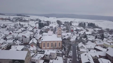 Aerial View Snow Covered Winter Village Small Church Germany Stock Footage 102474336