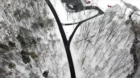 Aerial View of Snow Fall in Winter Season Video stock 246839375