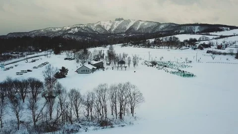 Aerial view of snow farm in winter, Toyako , Hokkaido, Japan Stock Footage 108908573