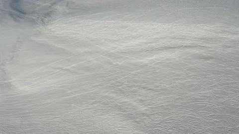 Aerial view snow mountain peak clouds in background 4k winter drone footage Ski Stock Footage 196914538