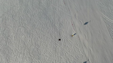 Aerial view snow mountain peak clouds in background 4k winter drone footage Ski Stock Footage 196914944