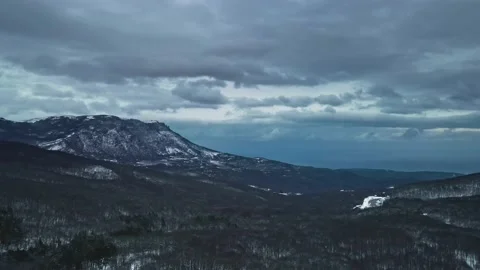 Aerial view of snow mountain range landscape Stock Footage 154804624