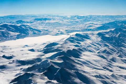 Aerial view of snow mountain range Stock Photos