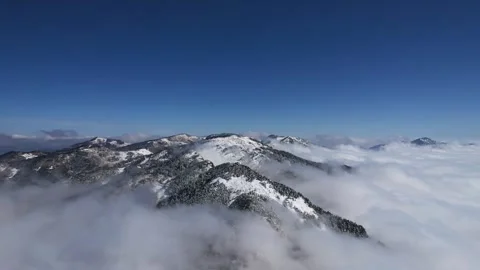 Aerial View of Snow Ridge Main Peak Valley Cloud Sea in Shennongjia Hubei China Stock Footage 337943291