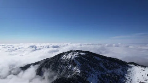 Aerial View of Snow Top Lone Peak Cloud Sea Mountain Group in Shennongjia Hubei Video stock 337939312