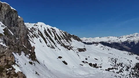 Aerial view of snowcapped mountains by winter, Courchevel, French alps Stock Footage 337647445