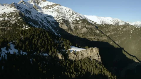 Aerial view on snowy mountain range overgrown by forest, Andorra Stockbeeldmateriaal 139497038