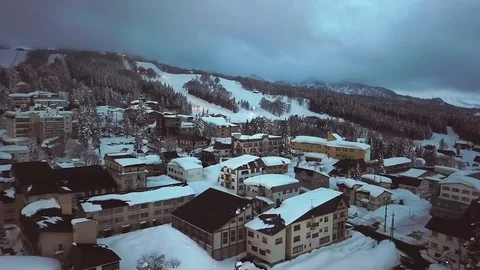 Aerial view of snowy mountain ski resort in Myoko, Niigata, Japan Stock Footage 107265136