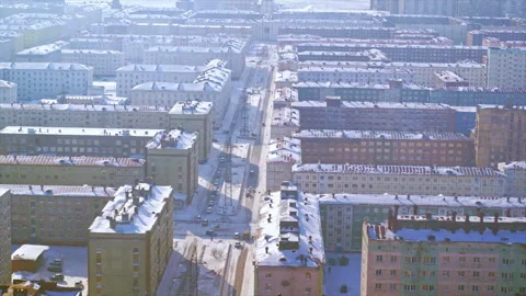 Aerial view of a snowy post soviet city Stock Footage 337021599