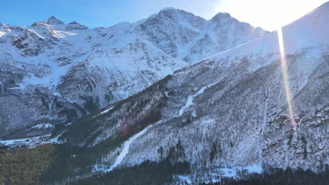 Aerial view of snowy winter mountains in Elbrus region Stock Footage 338007780