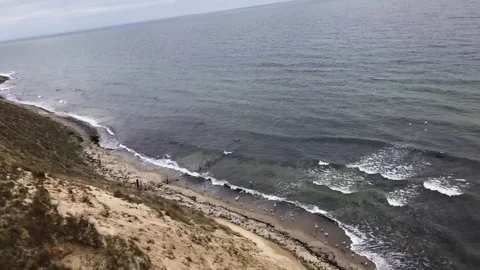 Aerial View Of Soaring Beach Cliff While Paragliding, Southern Sweden Stock Footage 117904929