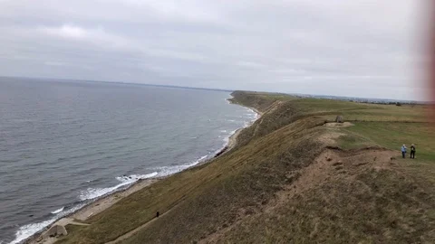 Aerial View Of Soaring Beach Cliff While Paragliding, Southern Sweden Stock Footage 117905414