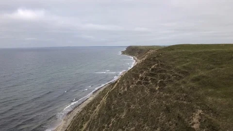 Aerial View Of Soaring Beach Cliff While Paragliding, Southern Sweden Stock Footage 117905420