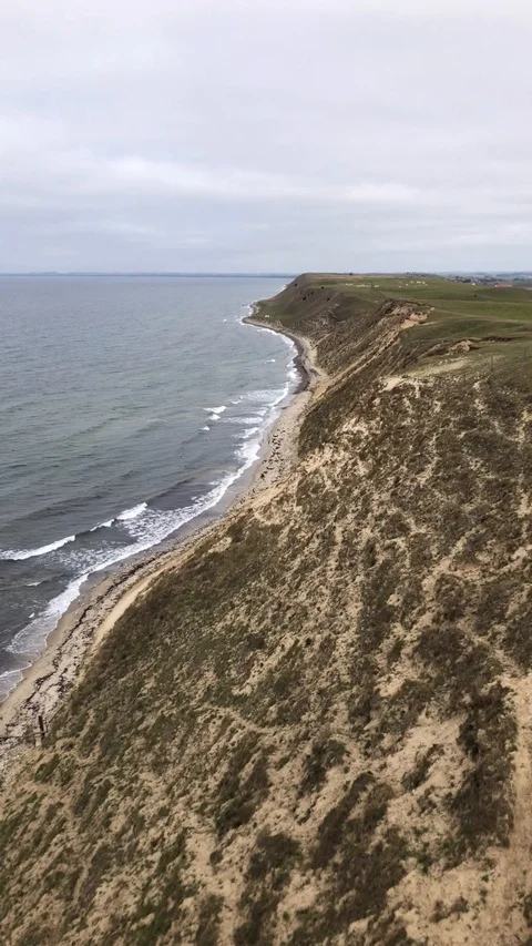 Aerial View Of Soaring Beach Cliff While Paragliding, Southern Sweden Stock Footage 117905465