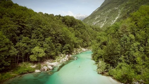 Aerial view of the Soca river surrounded by nature at summer time in Slovenia. Stock Footage 91249619