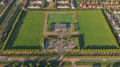 Aerial view of soccer fields and a sports complex in heerhugowaard 動画素材 342809685