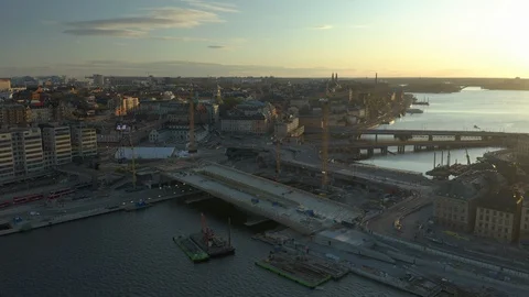 Aerial view of Sodermalm, Slussen &amp; Golden Bridge build site in Stockholm City Stock Footage 130122304