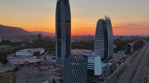 Aerial view of Sofia, Bulgaria at sunset, featuring modern high-rise buildings Stock Footage 345659543