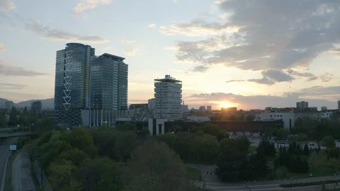 Aerial view of Sofia city with a skyscraper at sunset Vidéo 129389544