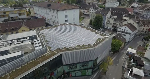 Aerial view of solar cell panels on a rooftop of residential building . Stock Footage 120966856