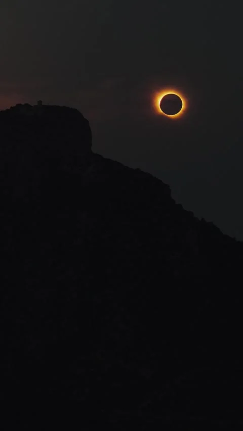Aerial view of solar eclipse over Dragonera, Spain. Stock Footage 342325975
