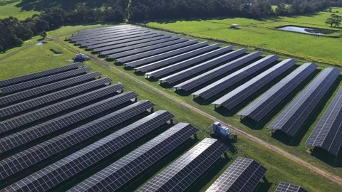 Aerial view of a solar farm generating clean energy Stock Footage 341270455