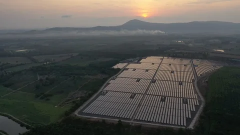 Aerial view of Solar Farm when sunrise and sunshine. Alternative energy. Stock Footage 111328173
