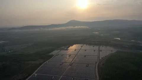 Aerial view of Solar Farm when sunrise and sunshine. Alternative energy. Stock Footage 111428537
