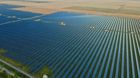 Aerial view of Solar Farm when sunrise and sunshine. Alternative energy. Stock Footage 157320741