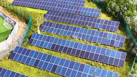 Aerial View of Solar Panel Array in Scottish Countryside Stock Footage 320594391