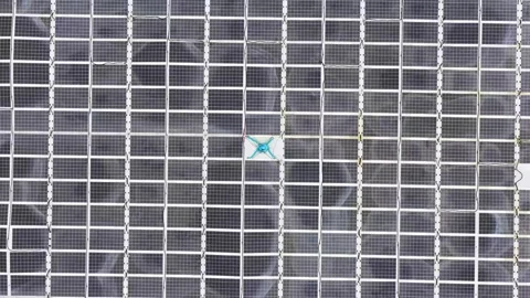 Aerial view of solar panel array with cleaning robot in Norway. Video stock 341583933