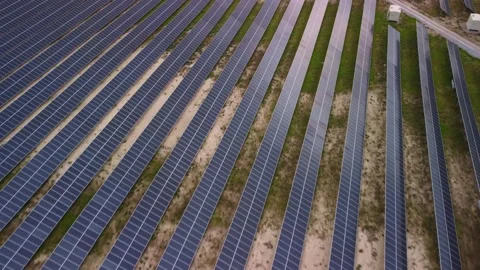 Aerial view of solar panel base in desert Stock Footage 154395564