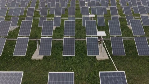 Aerial view of the solar panel farm. The drone flying over the solar panel Stock Footage 140211645