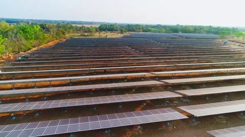 An aerial view of solar panel farm on dry land Stock Footage 210994400